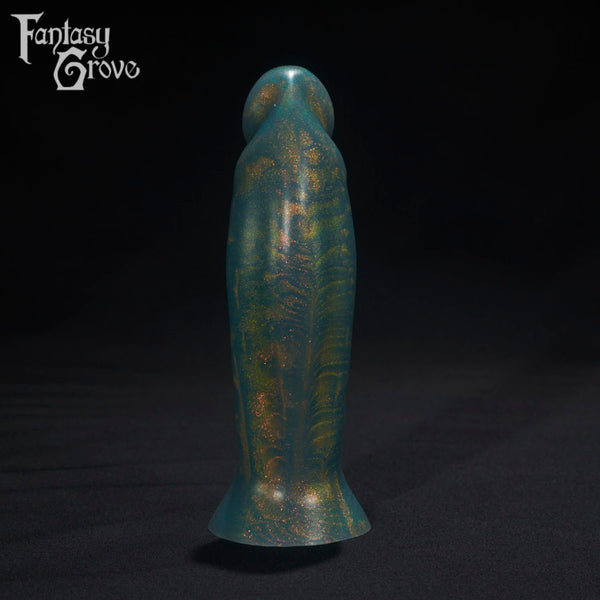 A Fantasy Grove sex toy on a black background with a logo in the upper left corner