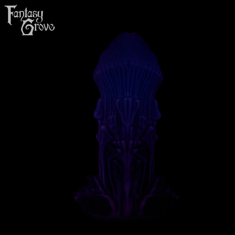A Fantasy Grove sex toy on a black background with a logo in the upper left corner
