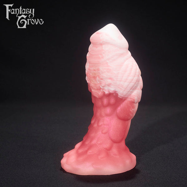 A fantasy sex toy on a black background with the Fantasy Grove logo in the upper left corner 