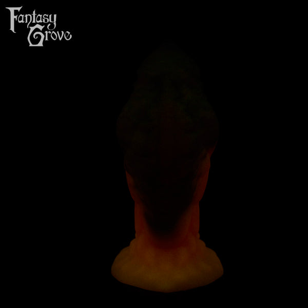 A fantasy sex toy on a black background with the Fantasy Grove logo in the upper left corner 
