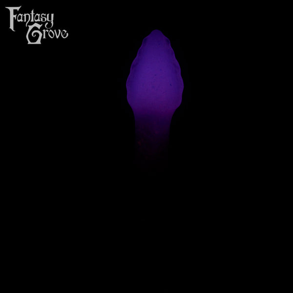 A fantasy sex toy on a black background with the Fantasy Grove logo in the upper left corner