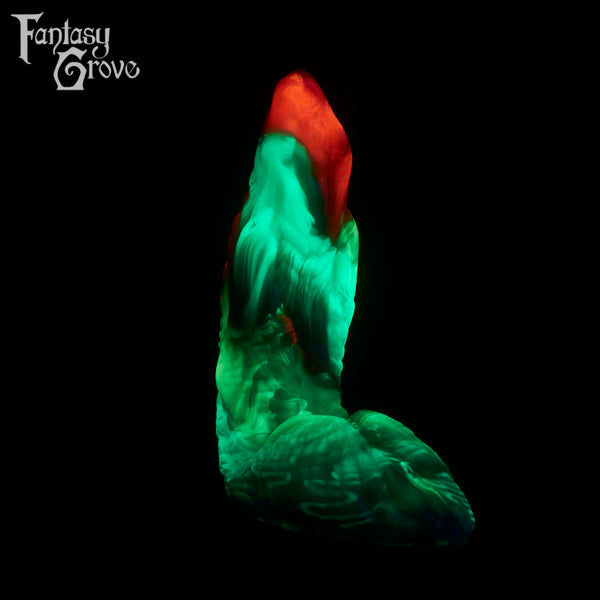 A fantasy sex toy on a black background with the Fantasy Grove logo in the upper left corner