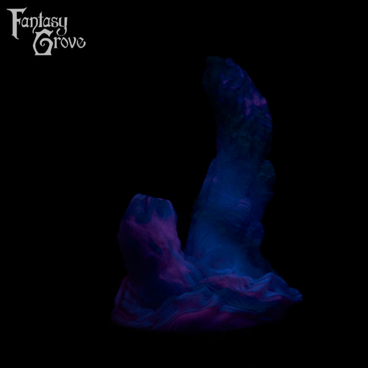 A fantasy sex toy on a black background with the Fantasy Grove logo in the upper left corner