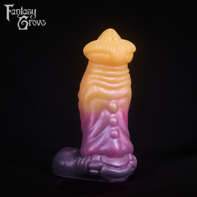 A fantasy sex toy on a black background with the Fantasy Grove logo in the upper left corner