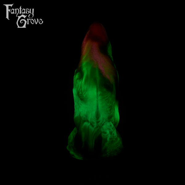 A fantasy sex toy on a black background with the Fantasy Grove logo in the upper left corner