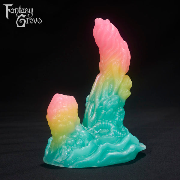 A fantasy sex toys on a black background with Fantasy Grove branding