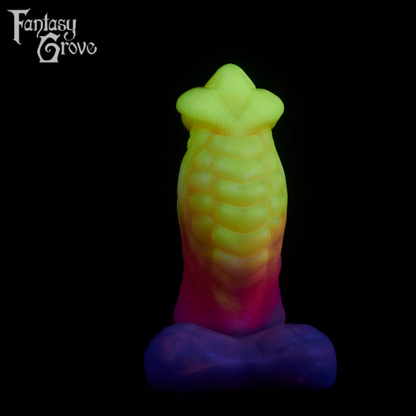 A fantasy sex toy on a black background with the Fantasy Grove logo in the upper left corner