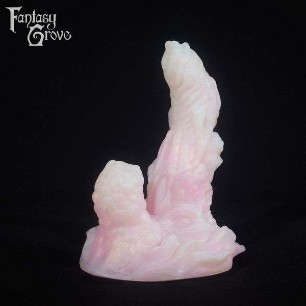A fantasy sex toy on a black background with the Fantasy Grove logo in the upper left corner