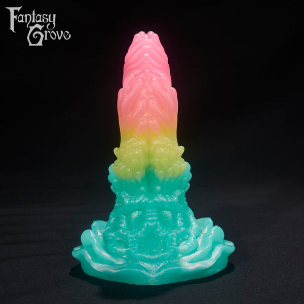 A fantasy sex toys on a black background with Fantasy Grove branding