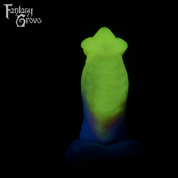 A fantasy sex toy on a black background with the Fantasy Grove logo in the upper left corner