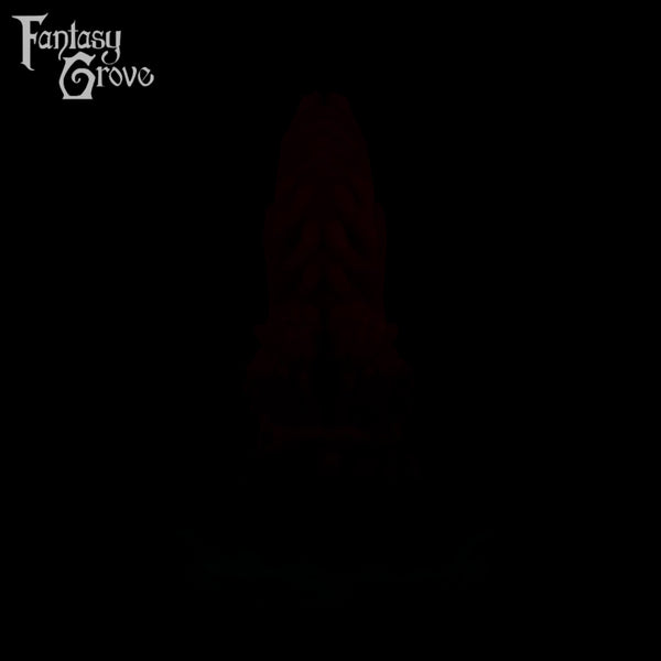 A fantasy sex toy on a black background with the Fantasy Grove logo in the upper left corner