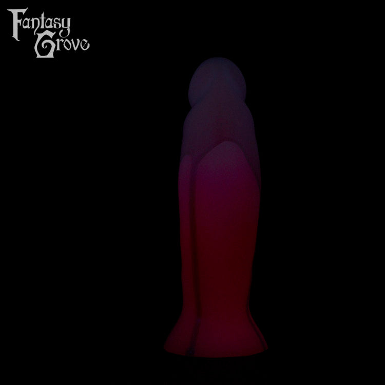 A Fantasy Grove sex toy on a black background with a logo in the upper left corner