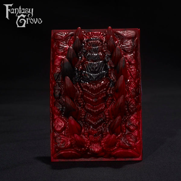 A Fantasy Grove sex toy on a black background with a logo in the upper left corner