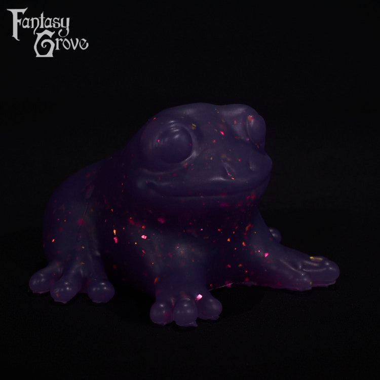 A fantasy sex toy on a black background with the Fantasy Grove logo in the upper left corner
