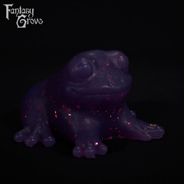 A fantasy sex toy on a black background with the Fantasy Grove logo in the upper left corner