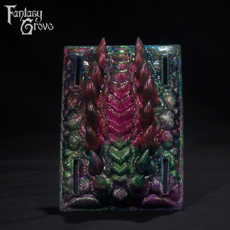 A Fantasy Grove sex toy on a black background with a logo in the upper left corner