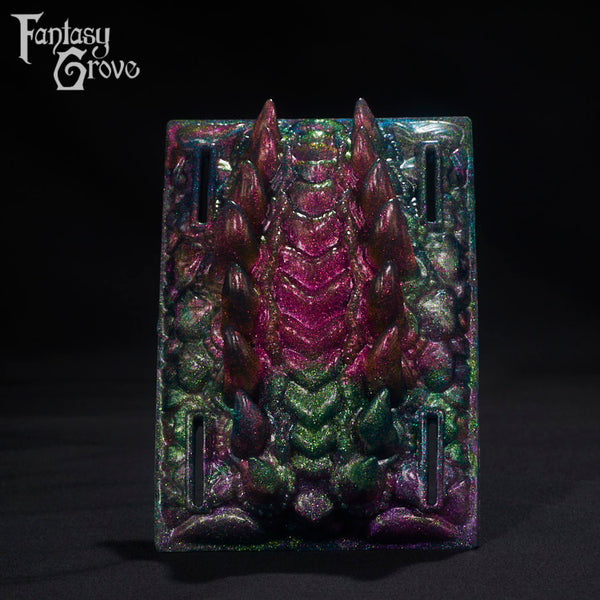 A Fantasy Grove sex toy on a black background with a logo in the upper left corner