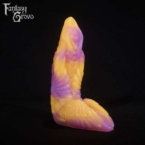 A fantasy sex toy on a black background with the Fantasy Grove logo in the upper left corner