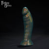 A Fantasy Grove sex toy on a black background with a logo in the upper left corner