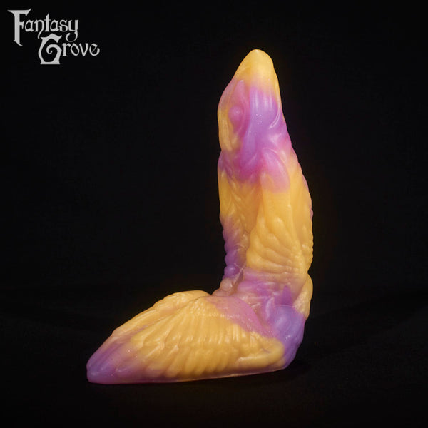 A fantasy sex toy on a black background with the Fantasy Grove logo in the upper left corner