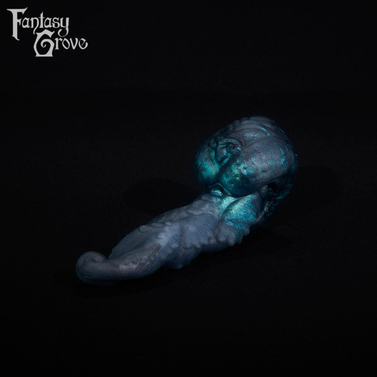 A fantasy sex toy on a black background with the Fantasy Grove logo in the upper left corner
