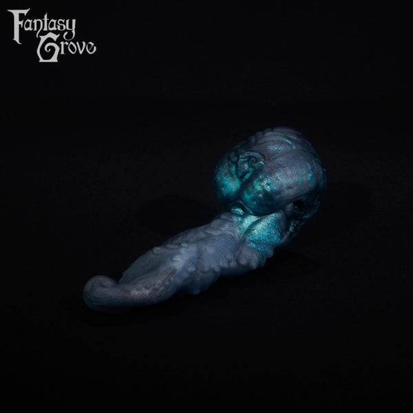 A fantasy sex toy on a black background with the Fantasy Grove logo in the upper left corner