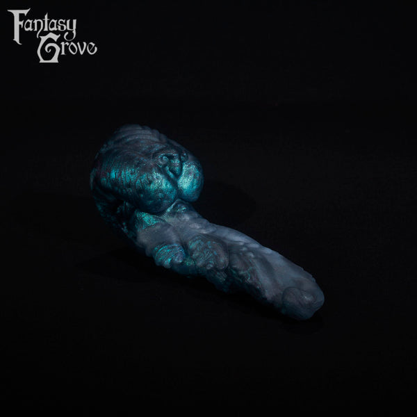 A fantasy sex toy on a black background with the Fantasy Grove logo in the upper left corner