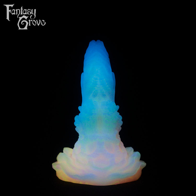 A fantasy sex toy on a black background with the Fantasy Grove logo in the upper left corner 