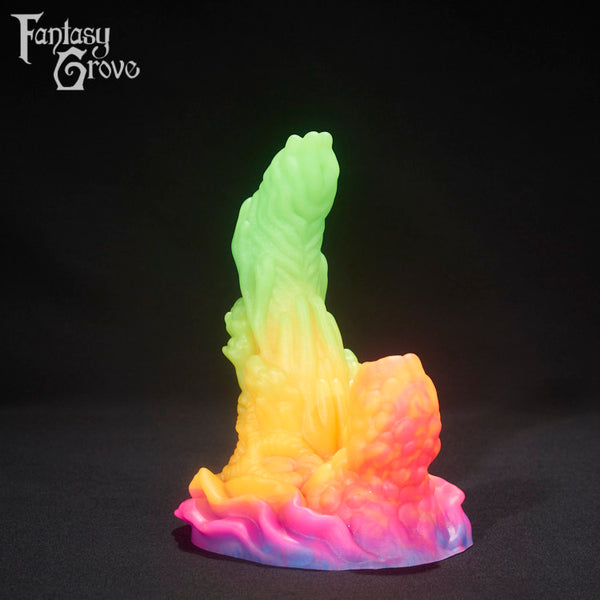 A fantasy sex toy on a black background with the Fantasy Grove logo in the upper left corner 