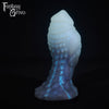 A fantasy sex toy on a black background with the Fantasy Grove logo in the upper left corner