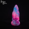 A fantasy sex toy on a black background with the Fantasy Grove logo in the upper left corner