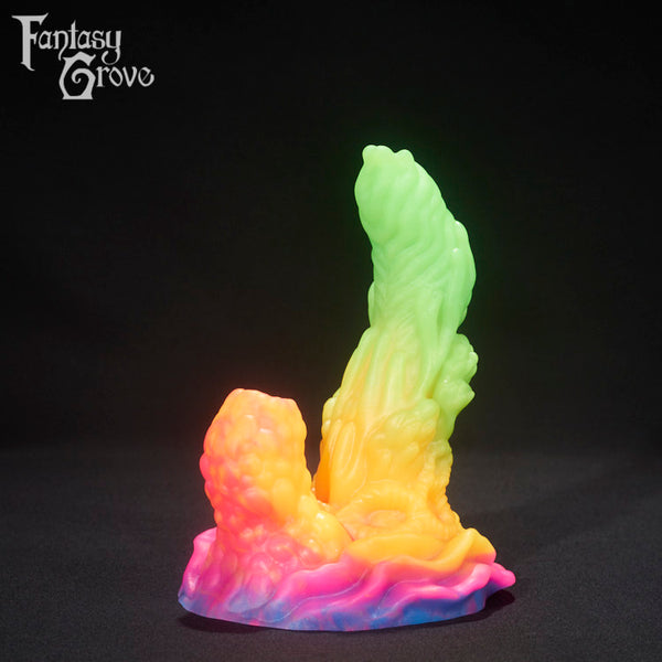 A fantasy sex toy on a black background with the Fantasy Grove logo in the upper left corner 