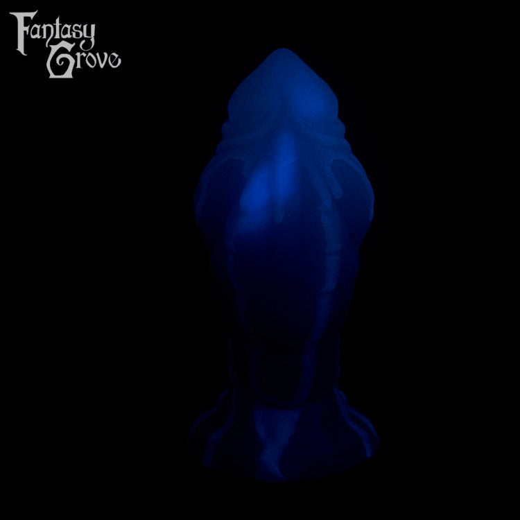 A fantasy sex toy on a black background with the Fantasy Grove logo in the upper left corner