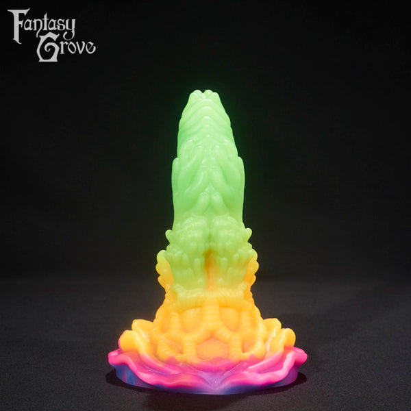 A fantasy sex toy on a black background with the Fantasy Grove logo in the upper left corner 