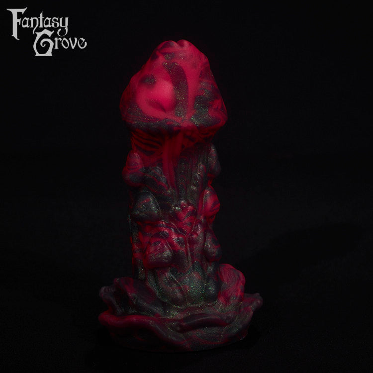 A fantasy sex toy on a black background with the Fantasy Grove logo in the upper left corner