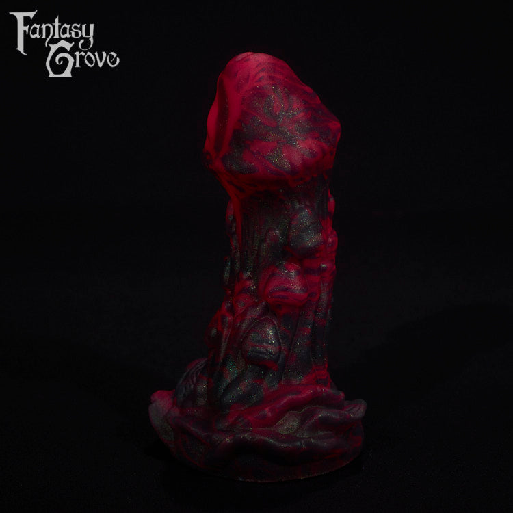 A fantasy sex toy on a black background with the Fantasy Grove logo in the upper left corner