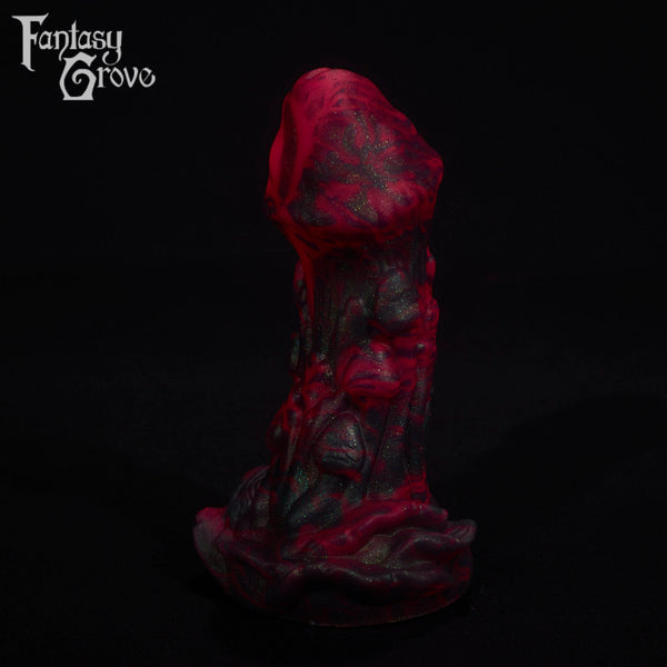 A fantasy sex toy on a black background with the Fantasy Grove logo in the upper left corner