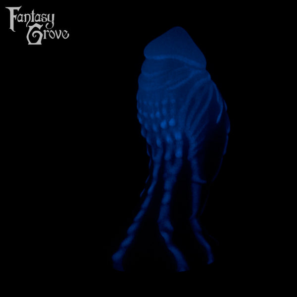 A fantasy sex toy on a black background with the Fantasy Grove logo in the upper left corner