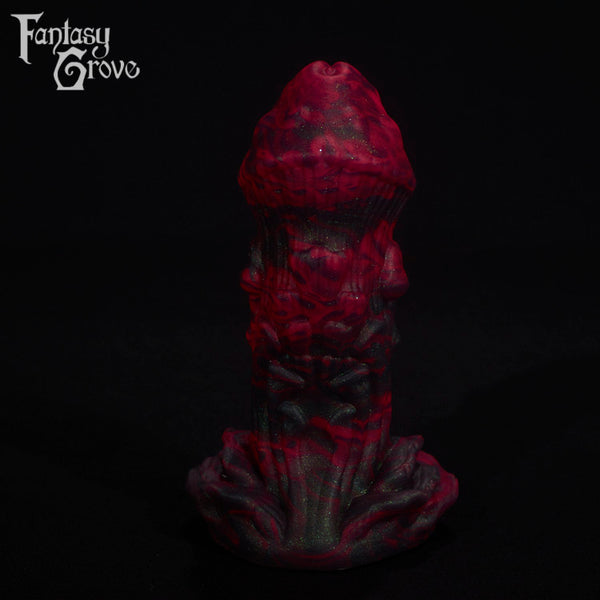 A fantasy sex toy on a black background with the Fantasy Grove logo in the upper left corner