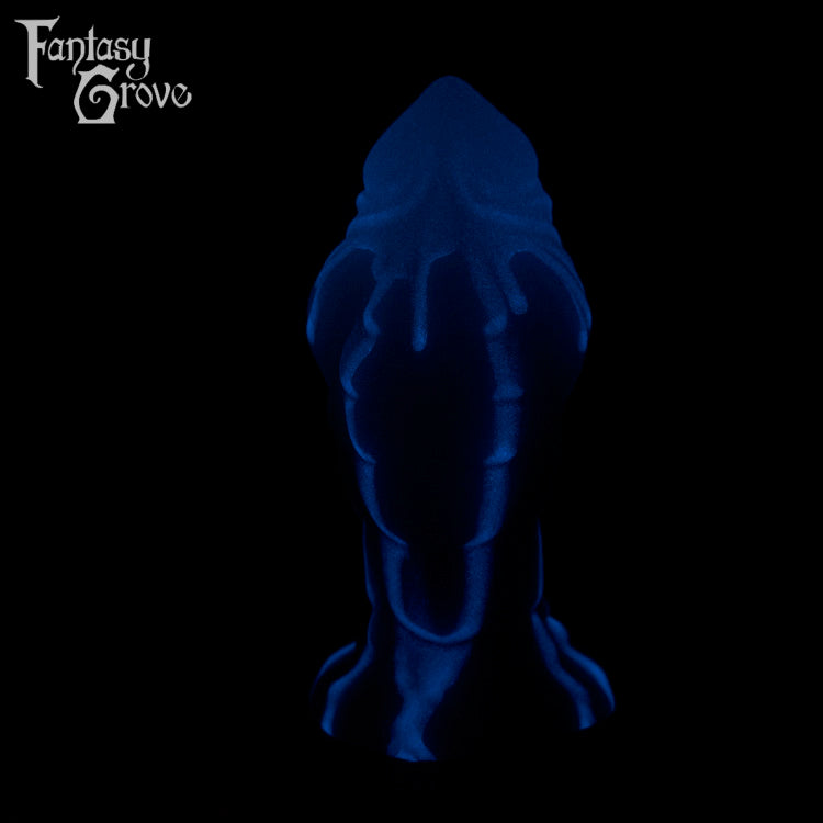 A fantasy sex toy on a black background with the Fantasy Grove logo in the upper left corner