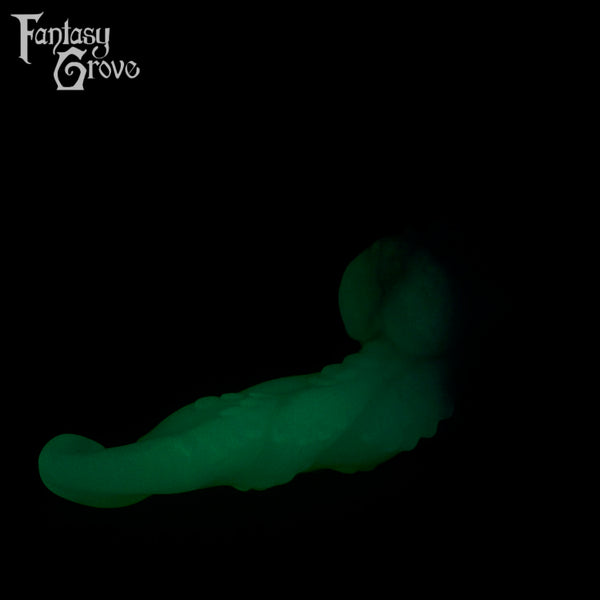 A fantasy sex toys on a black background with Fantasy Grove branding