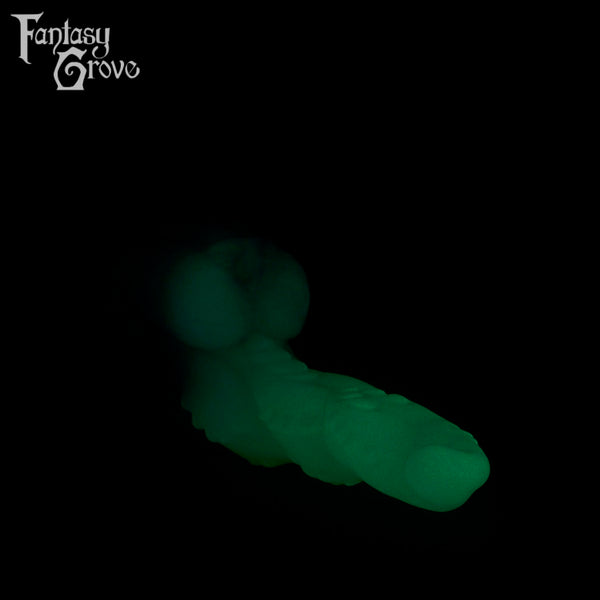 A fantasy sex toys on a black background with Fantasy Grove branding