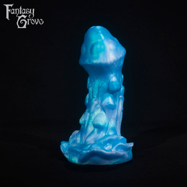 A fantasy sex toy on a black background with the Fantasy Grove logo in the upper left corner