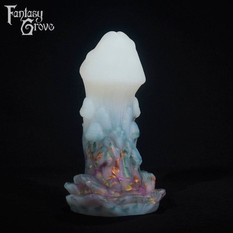 A fantasy sex toy on a black background with the Fantasy Grove logo in the upper left corner