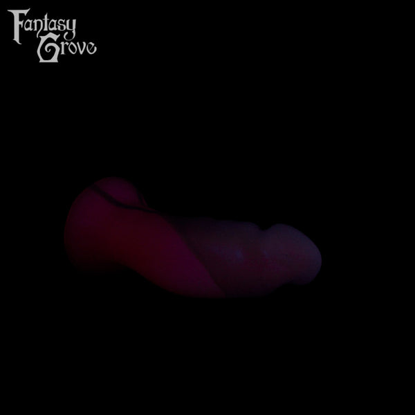 A Fantasy Grove sex toy on a black background with a logo in the upper left corner
