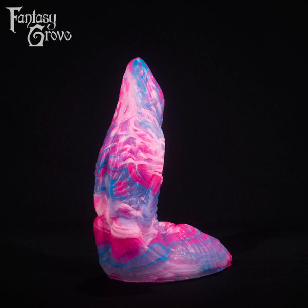 A fantasy sex toy on a black background with the Fantasy Grove logo in the upper left corner