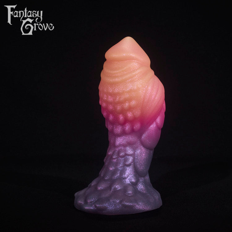 A fantasy sex toy on a black background with the Fantasy Grove logo in the upper left corner
