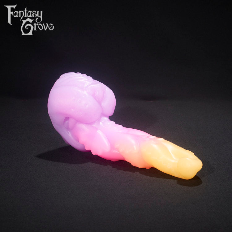 A fantasy sex toy on a black background with the Fantasy Grove logo in the upper left corner 
