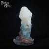 A fantasy sex toy on a black background with the Fantasy Grove logo in the upper left corner