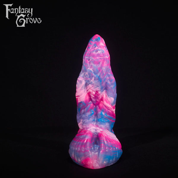 A fantasy sex toy on a black background with the Fantasy Grove logo in the upper left corner